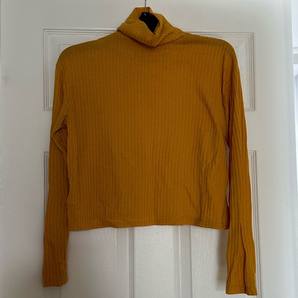 Yellow turtleneck